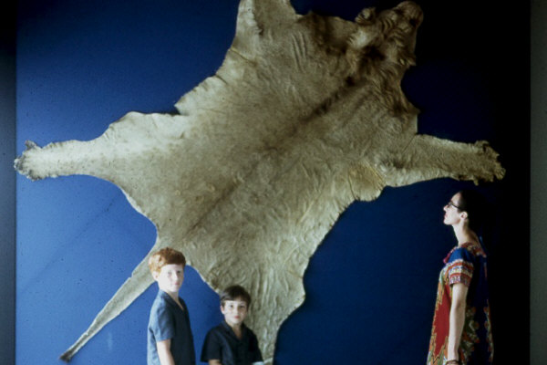 Al, brother and mom next to lion skin